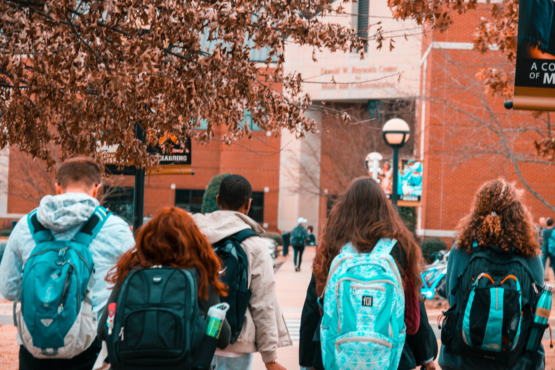 people wearing backpacks